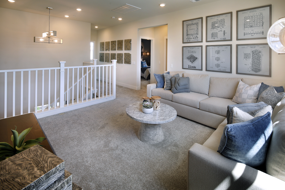 A living room with a couch and a coffee table.