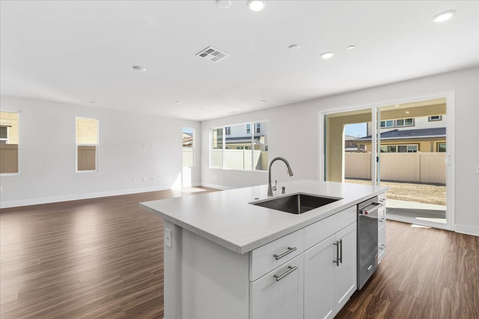 A kitchen with a large island.
