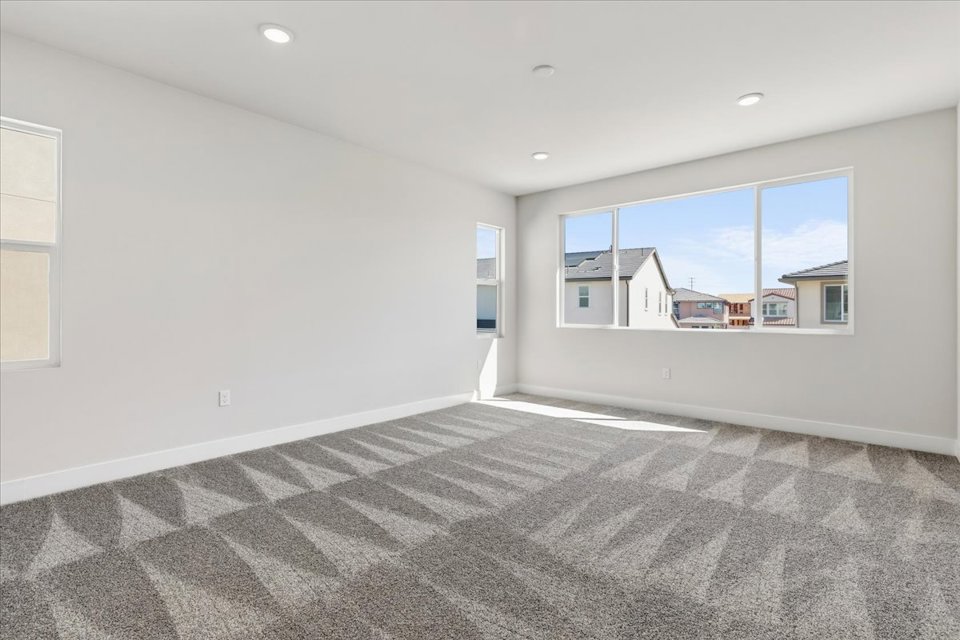 A room with a large window.