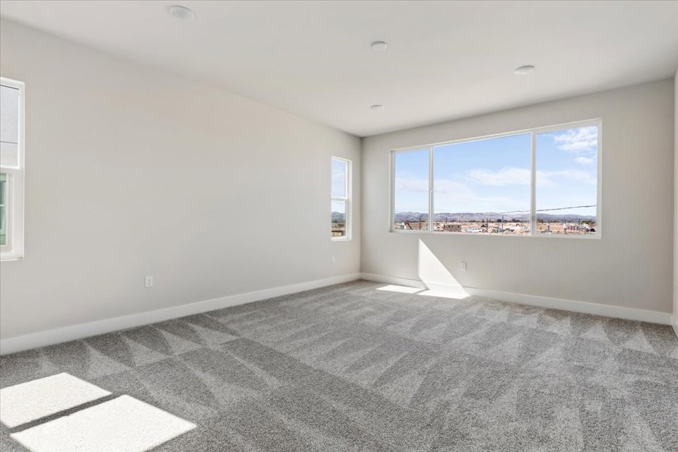 A room with a large window.