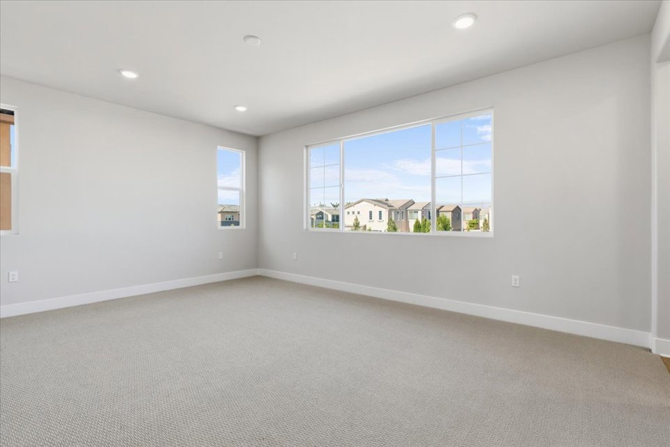 A room with a large window.