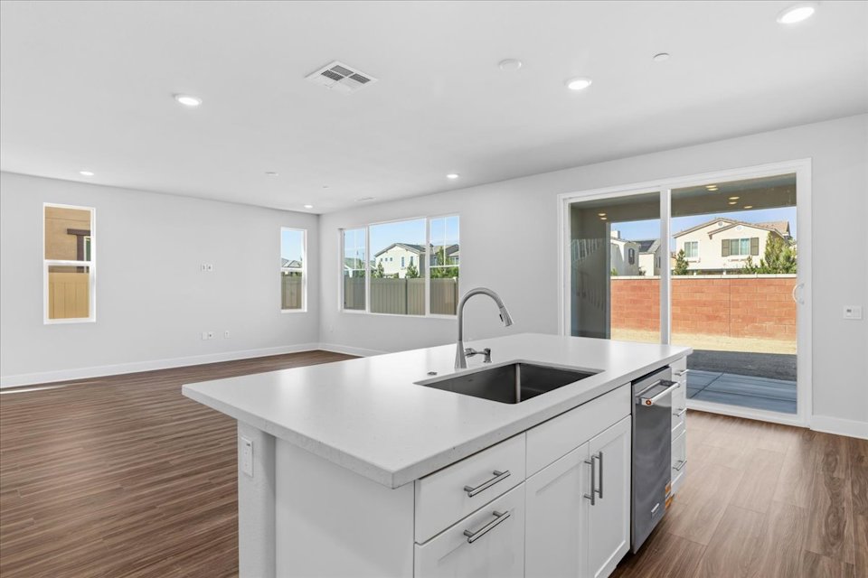 A kitchen with a large island.