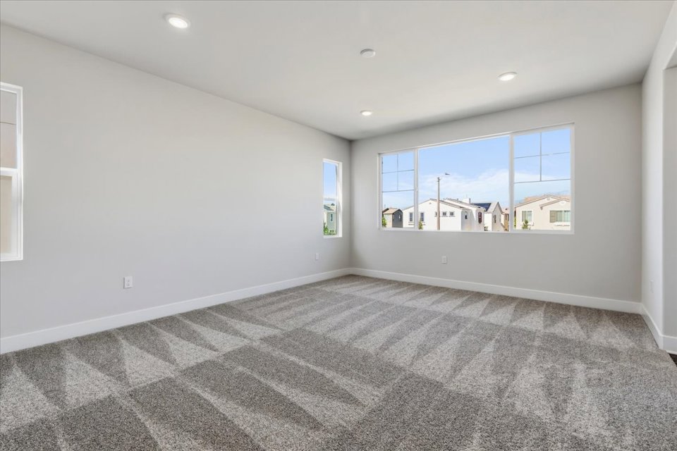 A room with a large window.