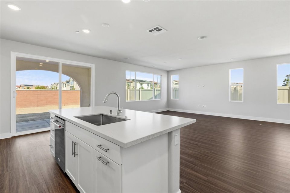 A kitchen with a large island.