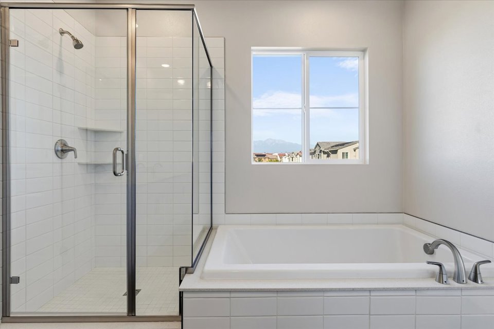 A bathroom with a glass shower.