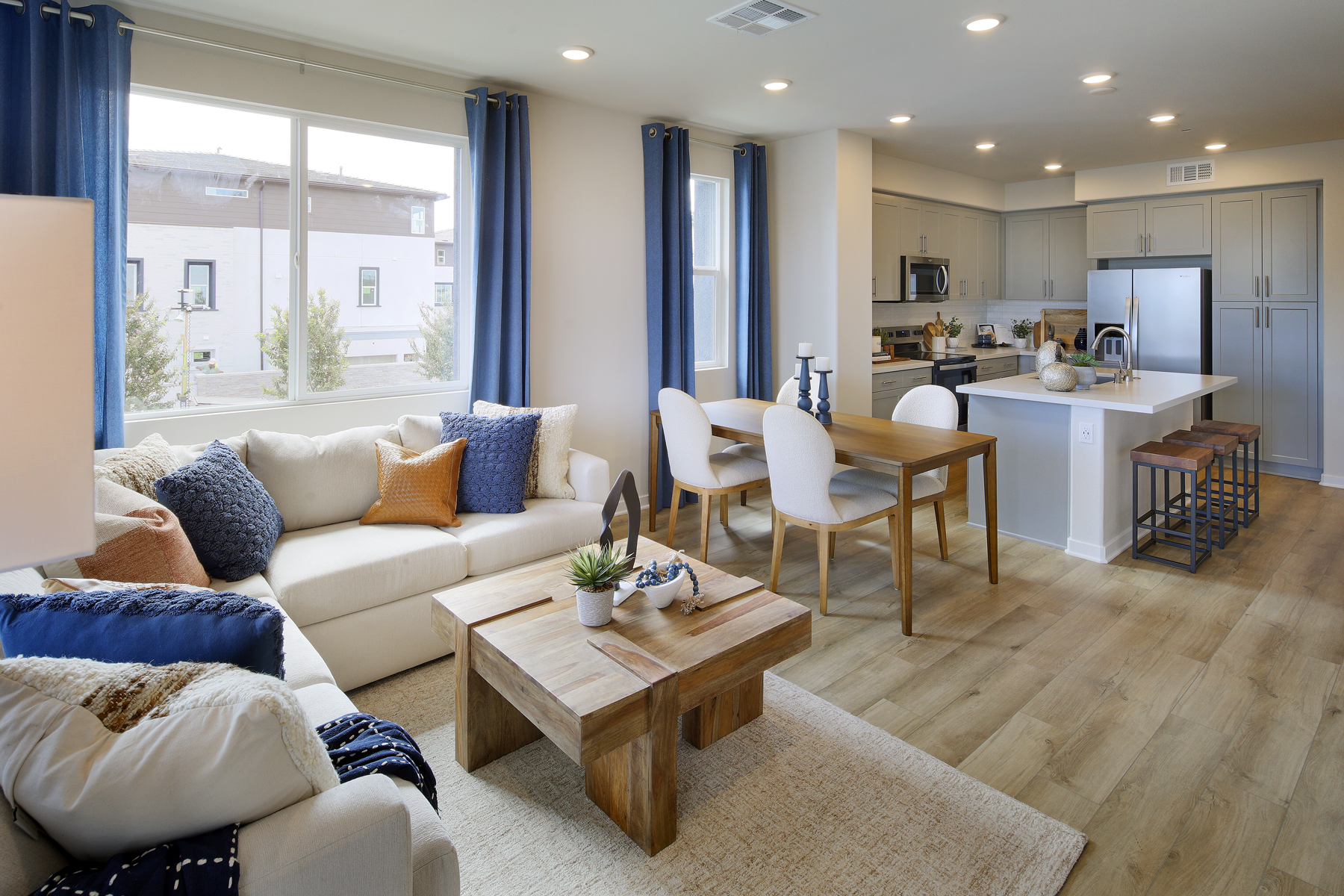 A living room with a large window.
