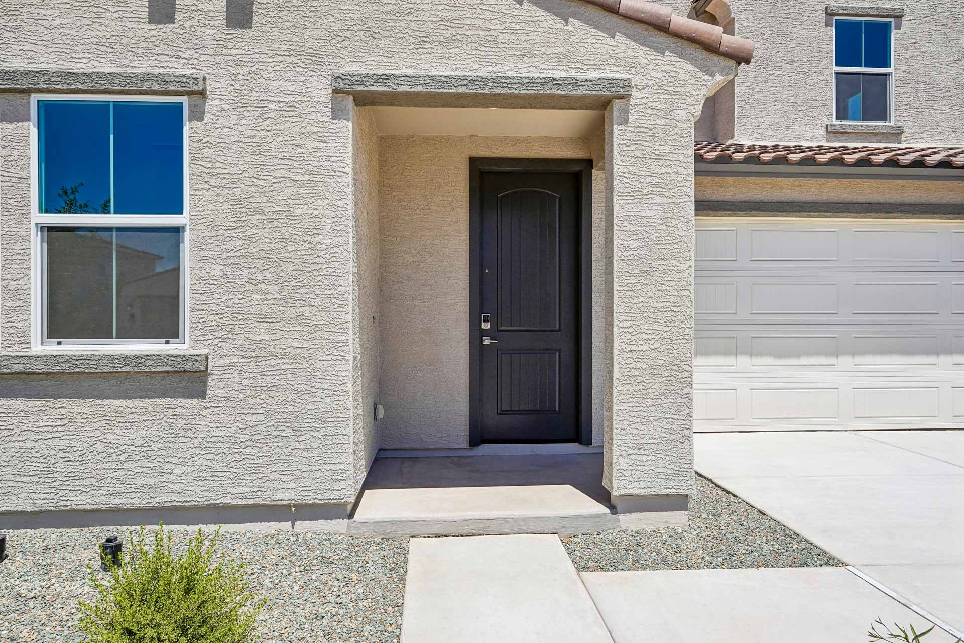 A building with a black door.