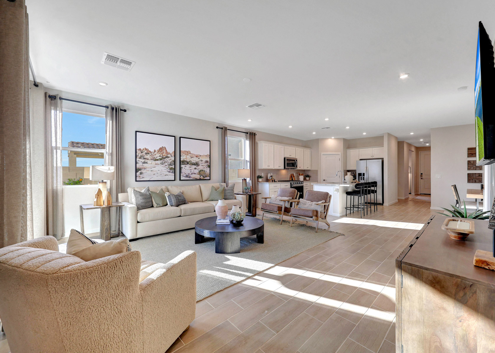 A living room with a large window.