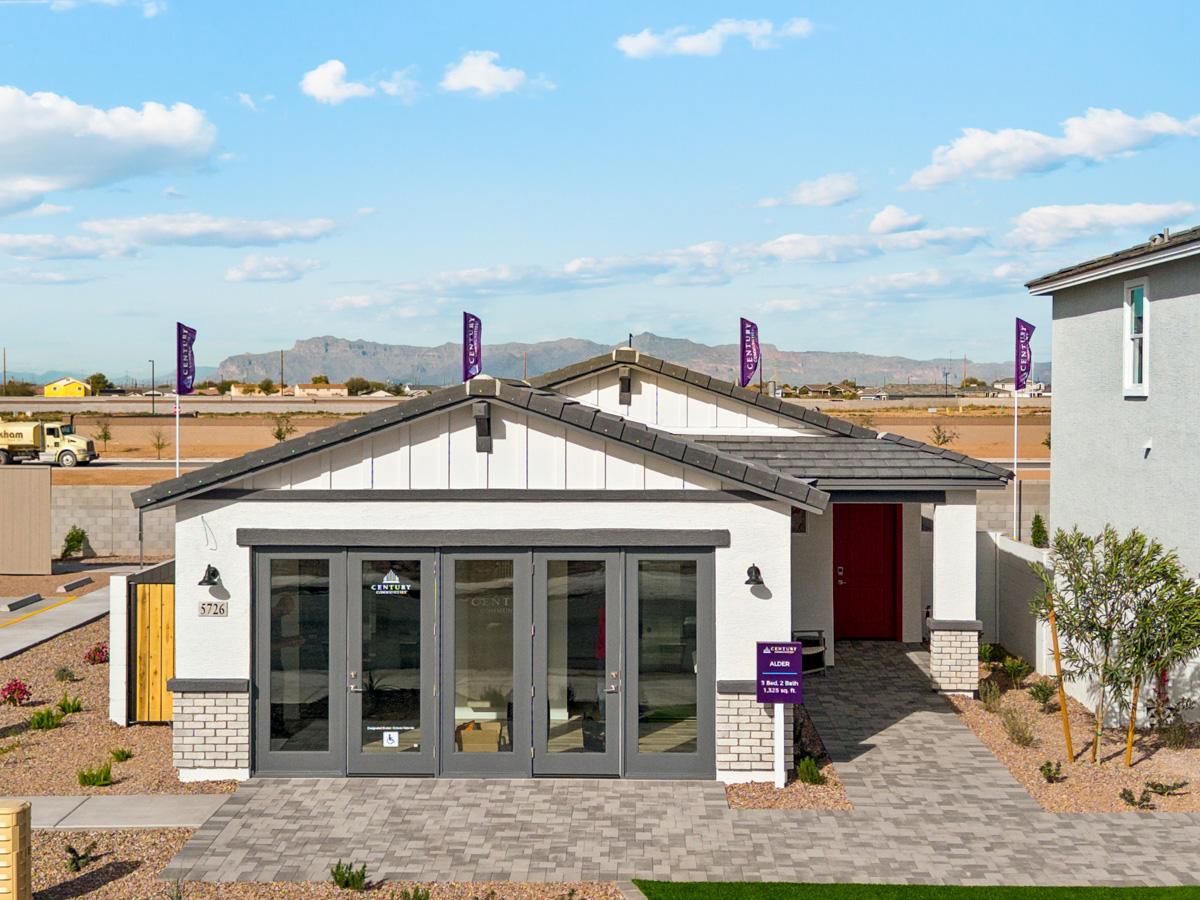 A building with a stone patio.