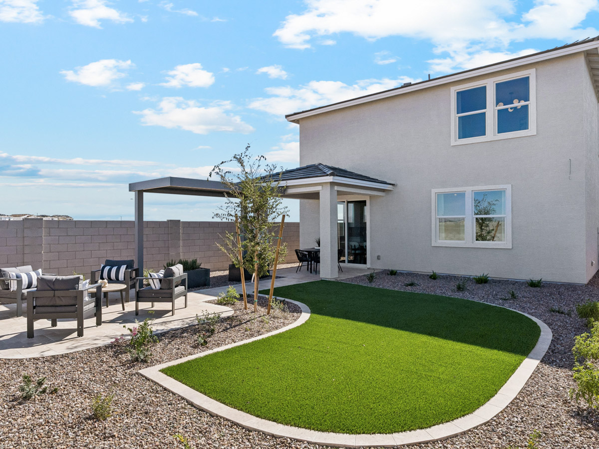 A house with a large front yard.