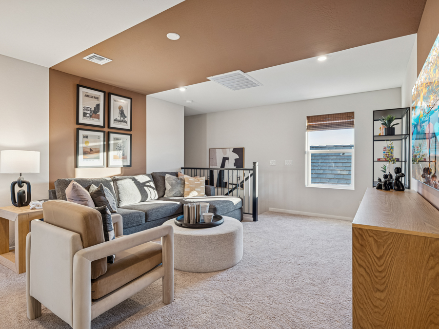 A living room with a couch and a coffee table.
