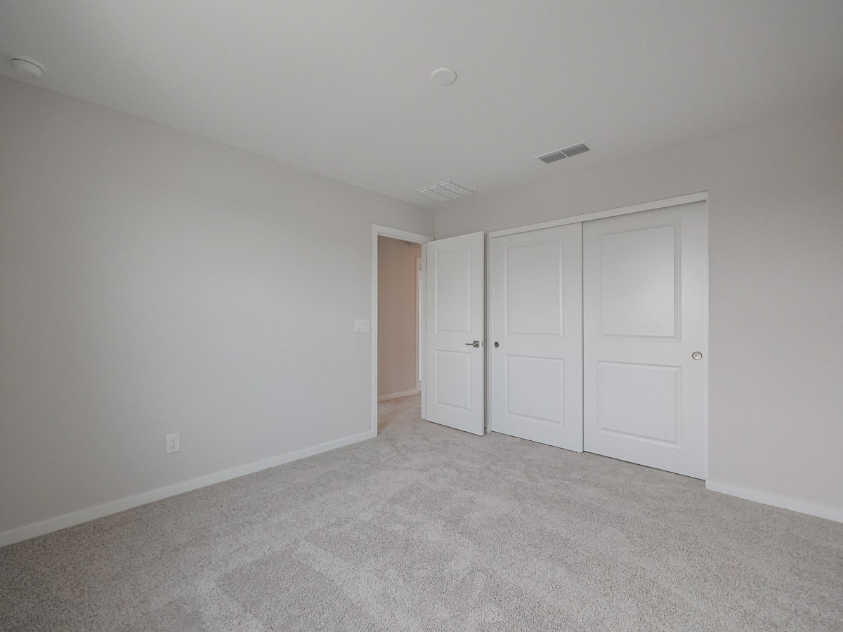 A room with white doors.