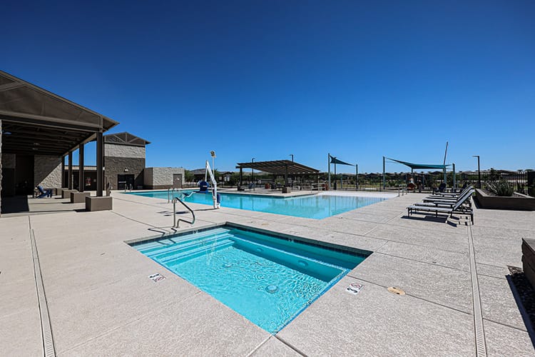 A swimming pool in a large courtyard.