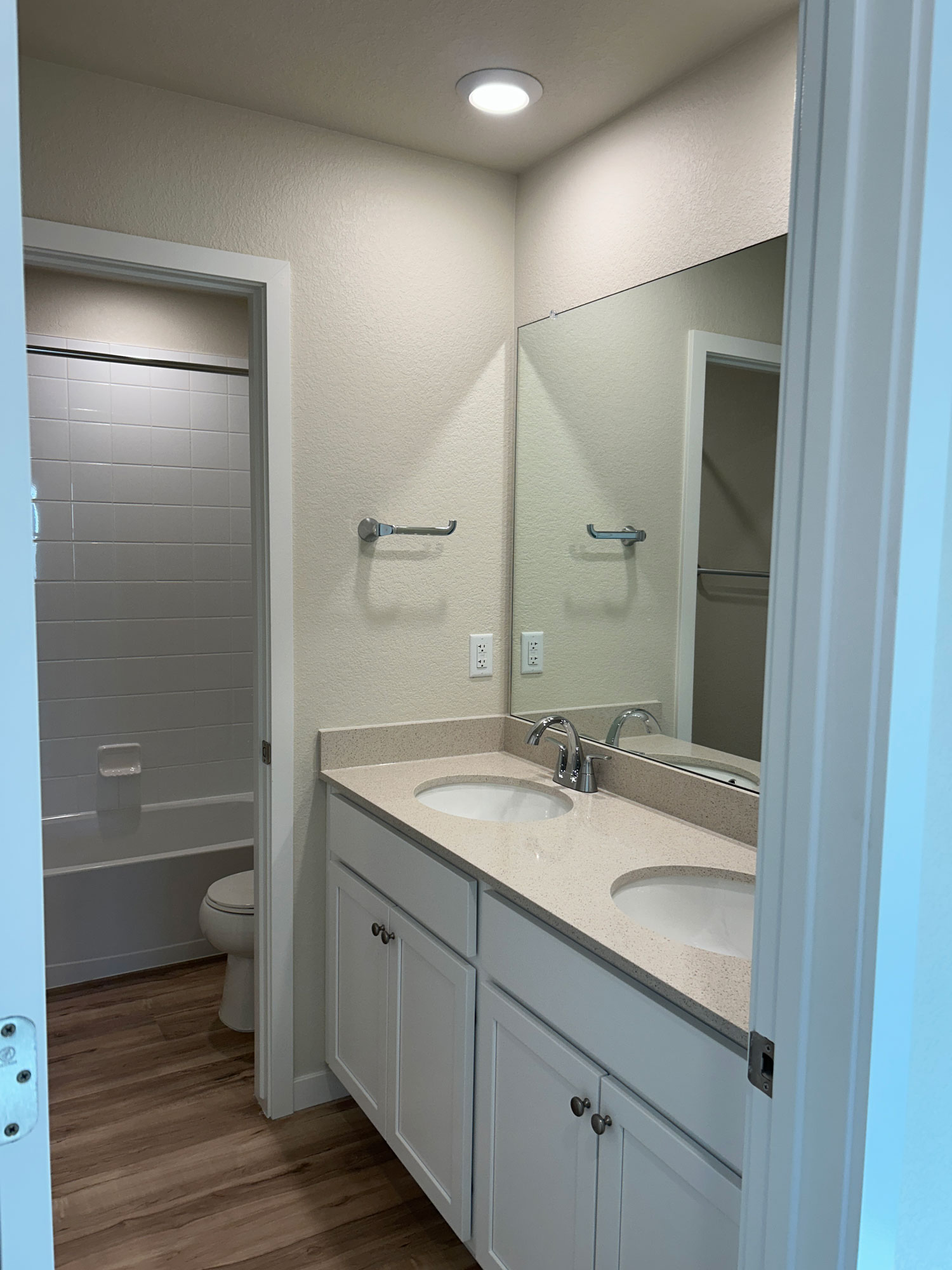 A bathroom with a sink and a toilet.