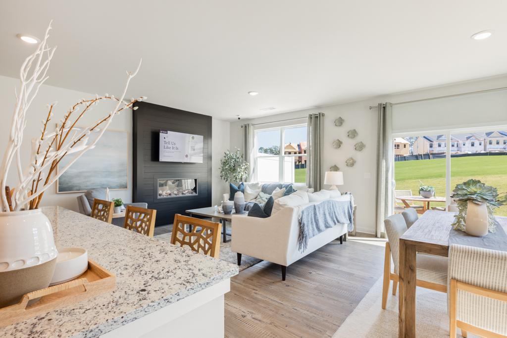 A living room with a large window.