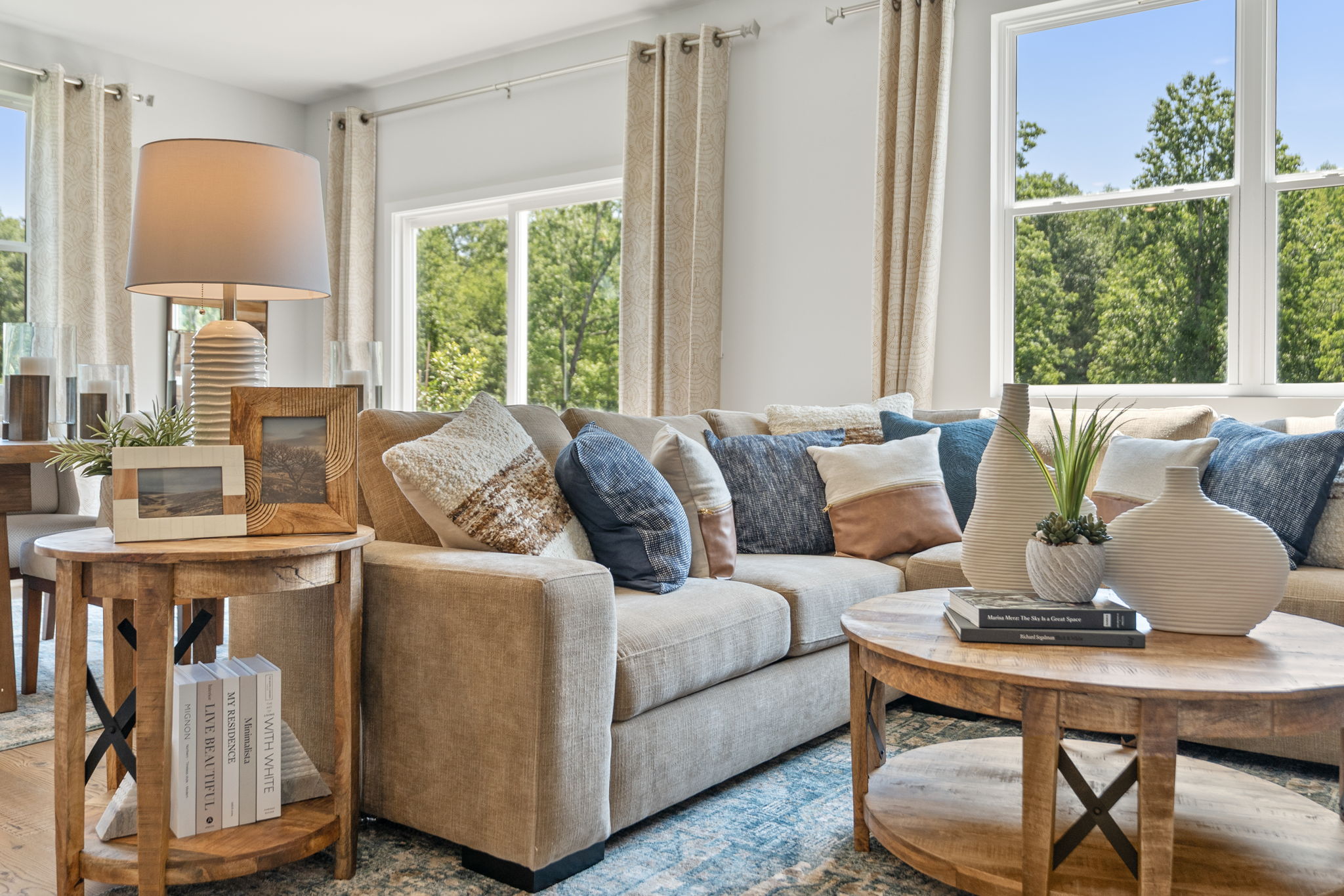 A living room with a couch and a coffee table.