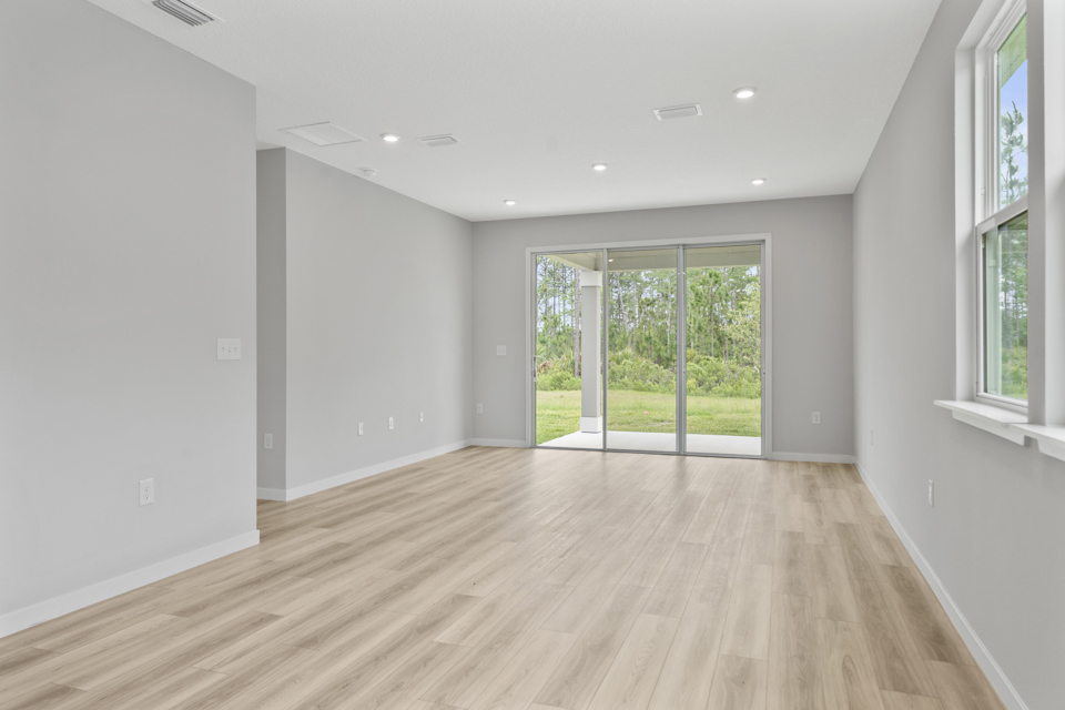 Sanibel II Floorplan Lot 143 Great Room with Patio Door at Seminole Palms in Palm Coast
