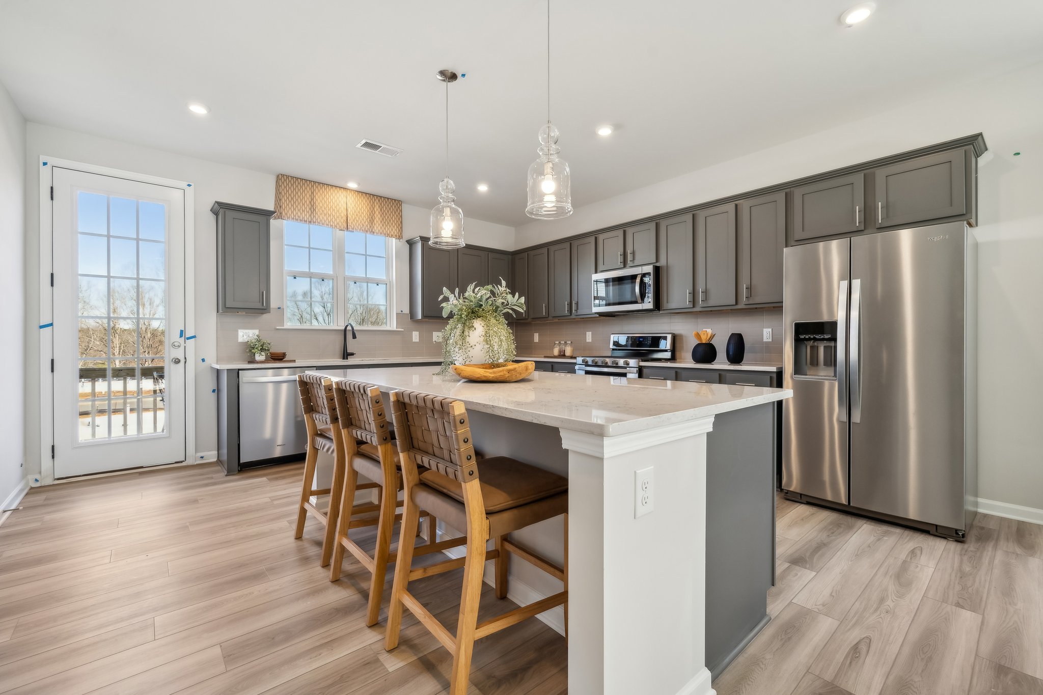 A kitchen with a large island.