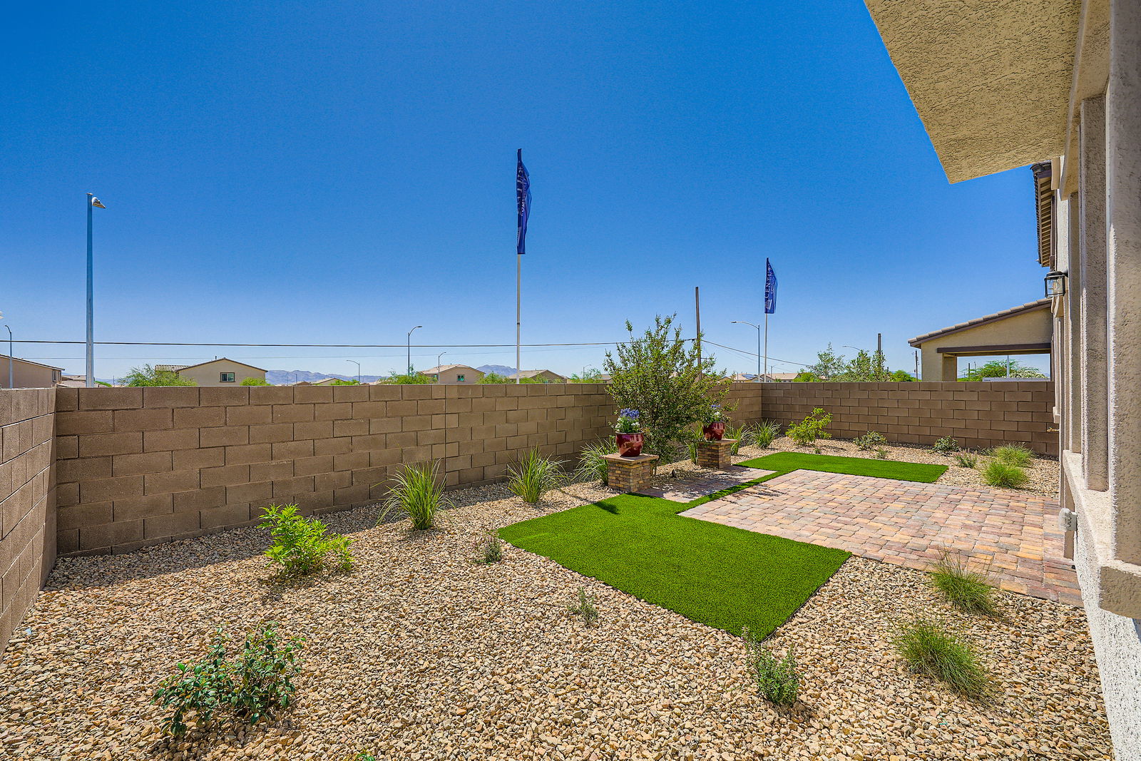 A small courtyard with flags.