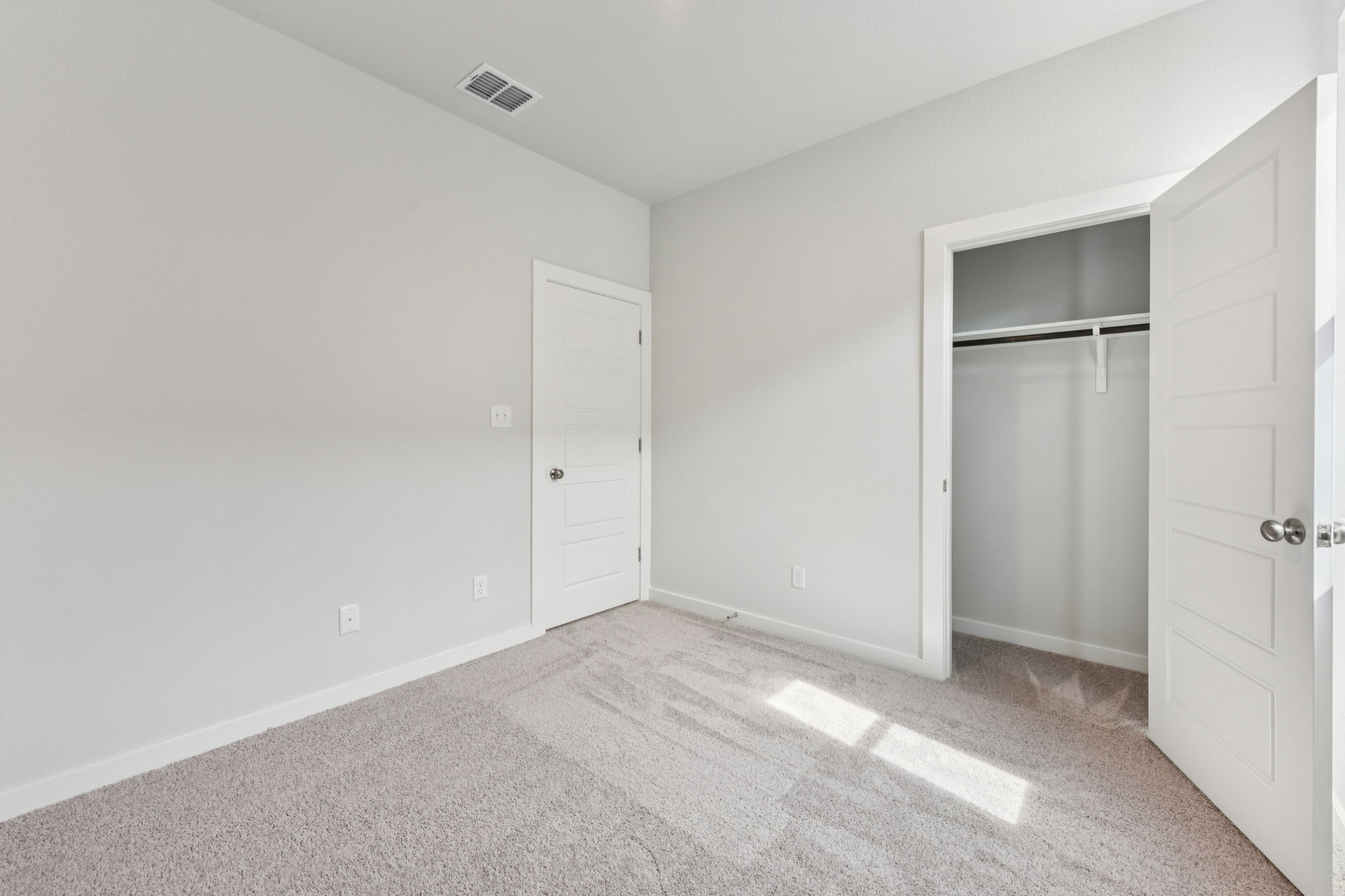 A room with white doors.