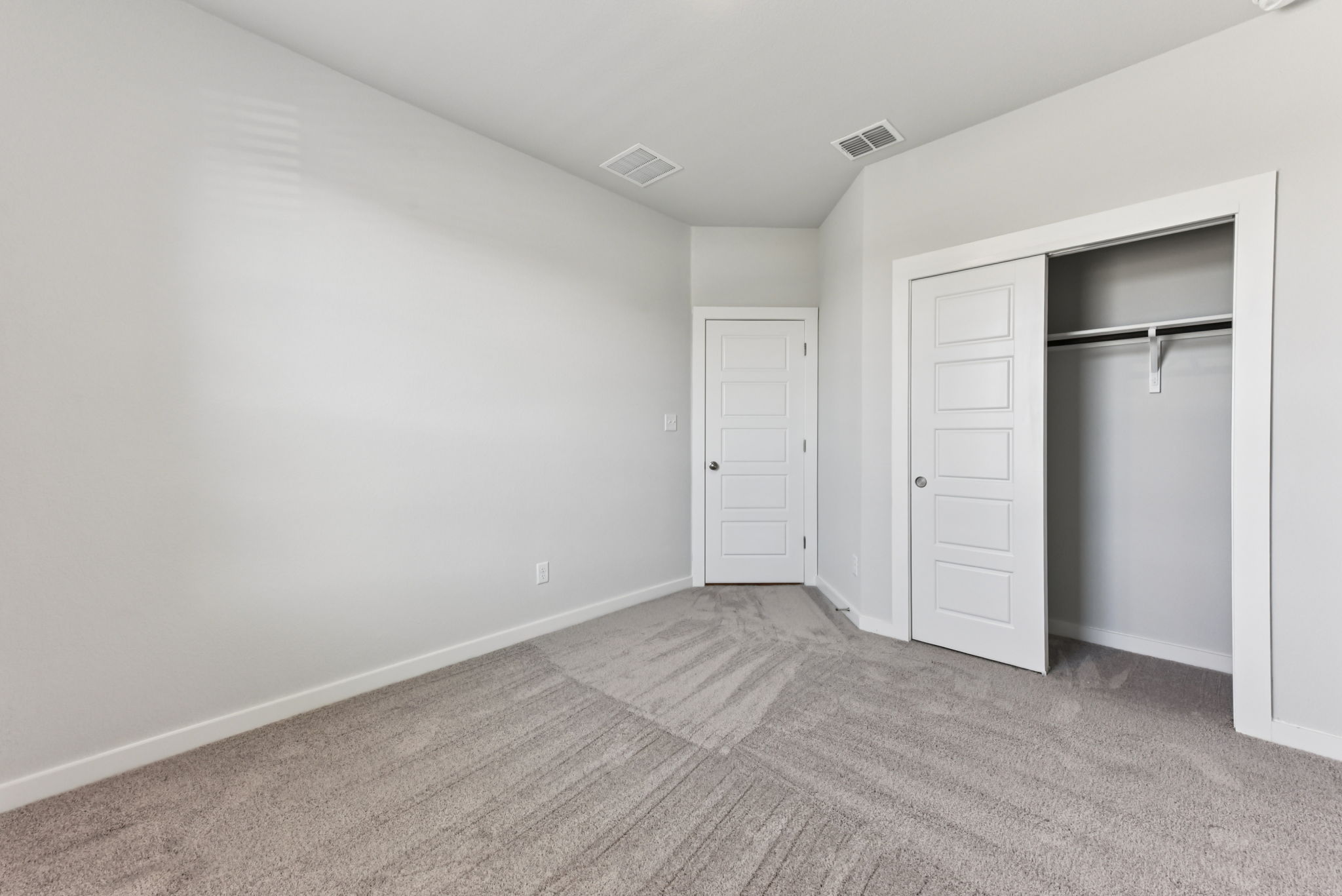 A room with white doors.