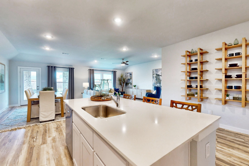 A kitchen with a large island.