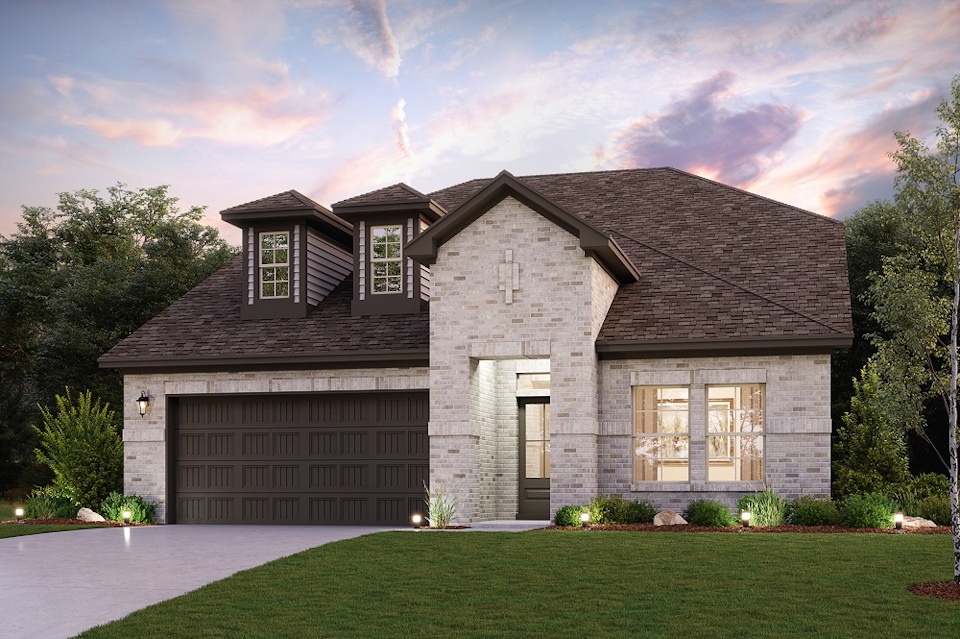 A house with a large front yard.