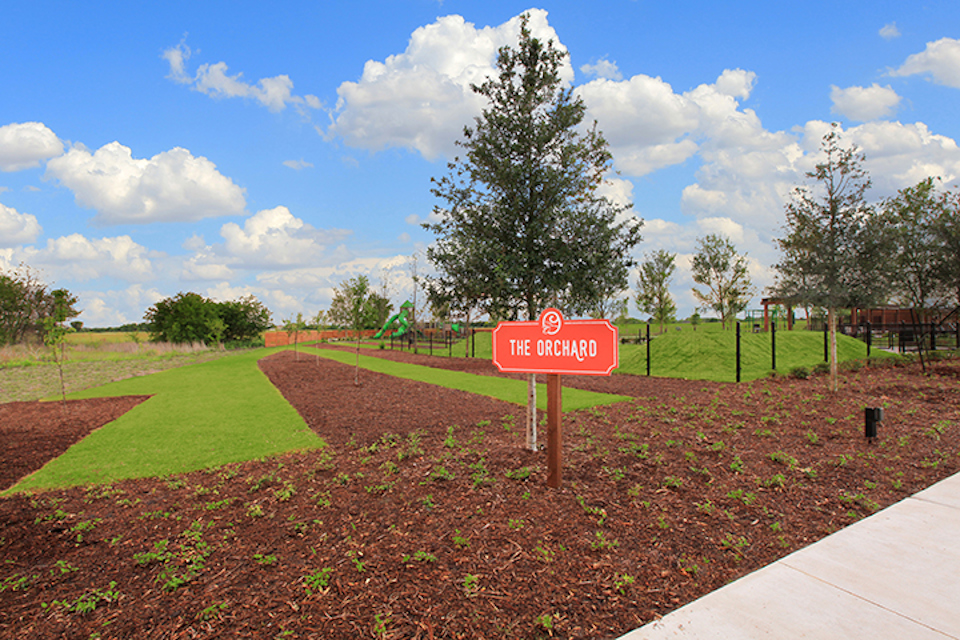 A sign in a park.