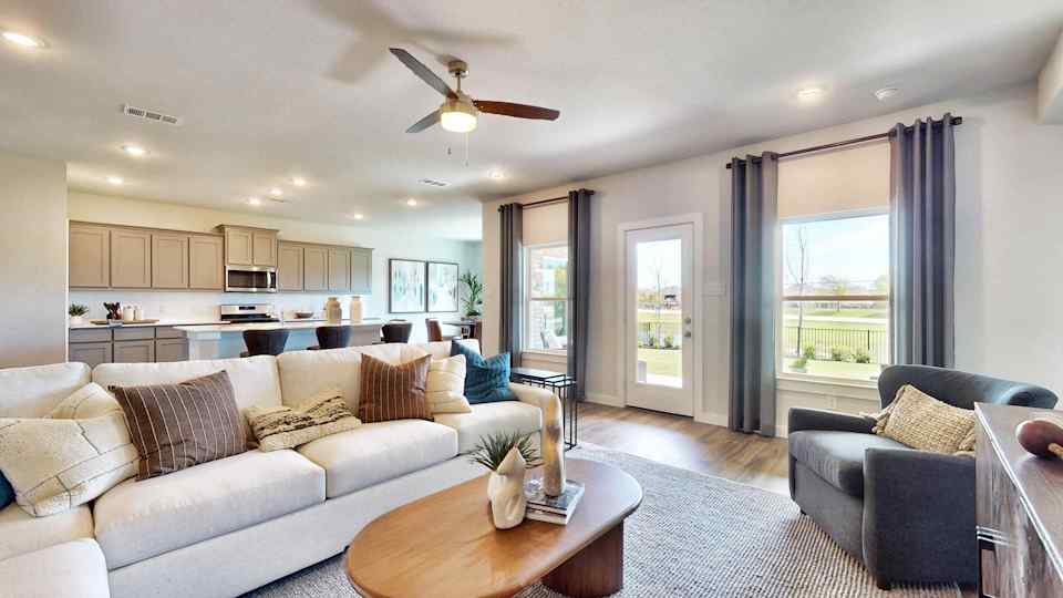 A living room with a large window.
