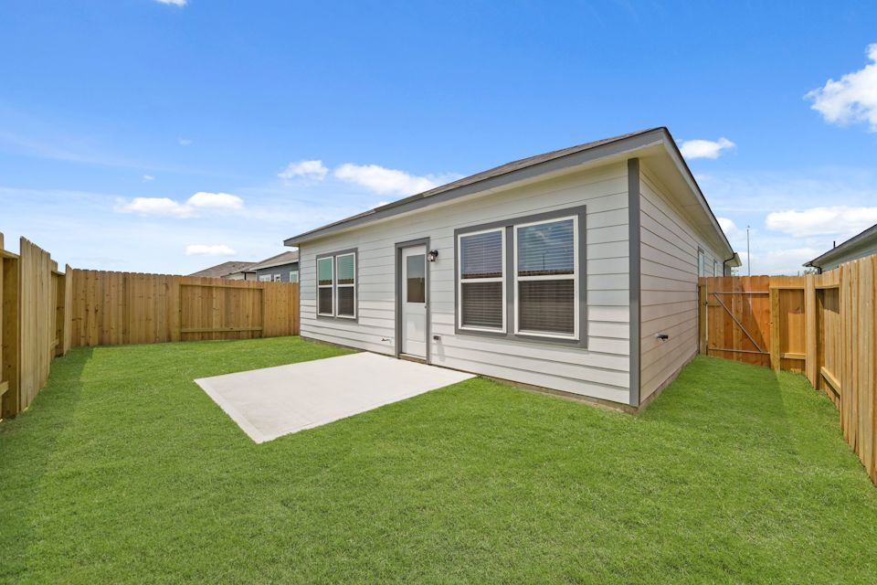 A house with a fence around it.