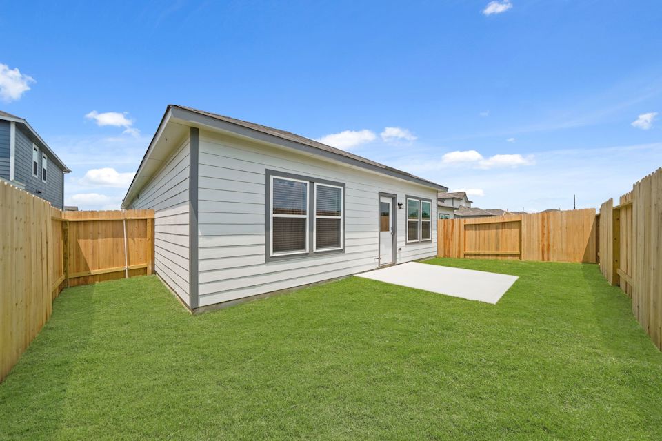 A house with a fence around it.