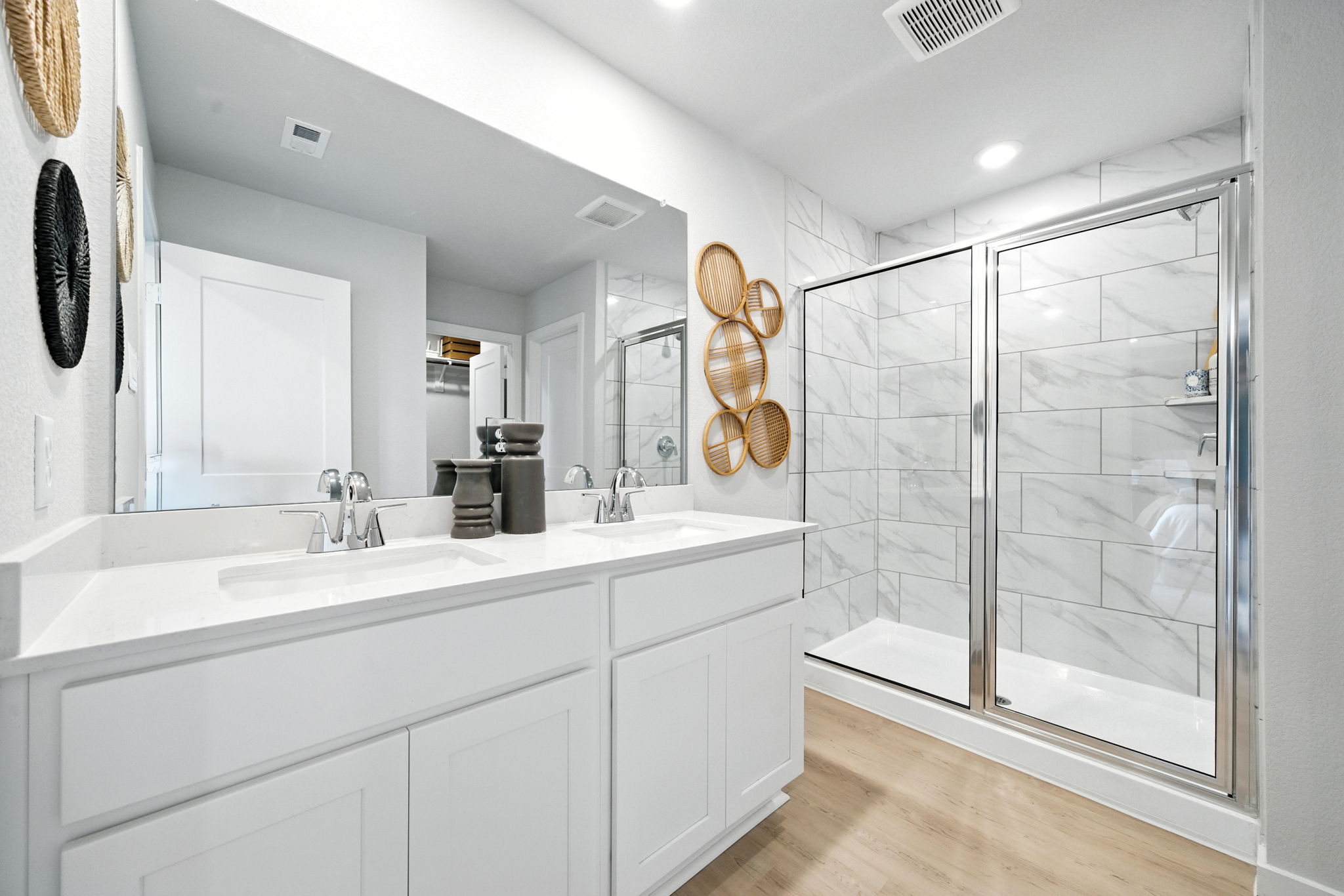 A bathroom with a glass shower.