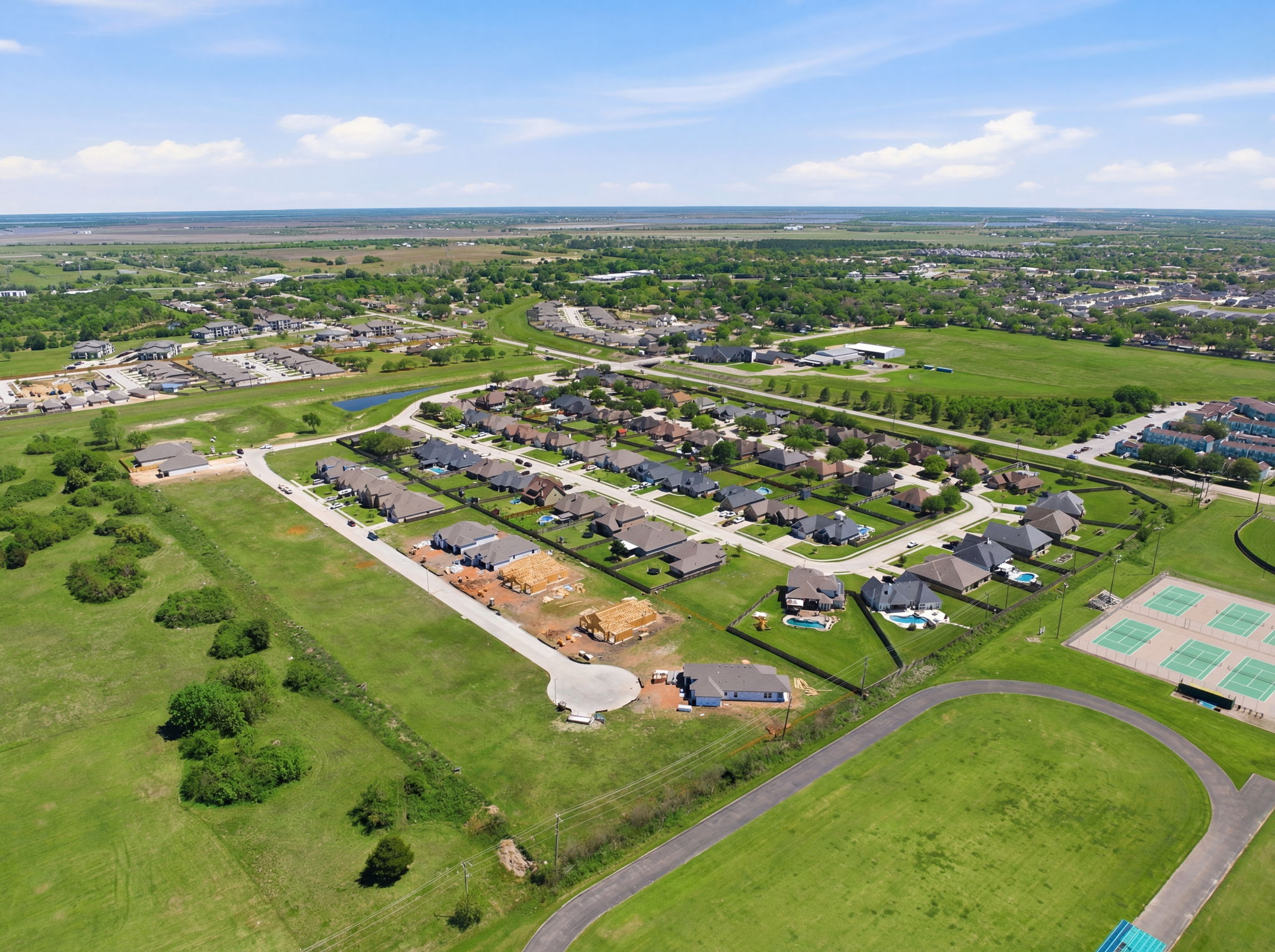 A large area with buildings and trees.