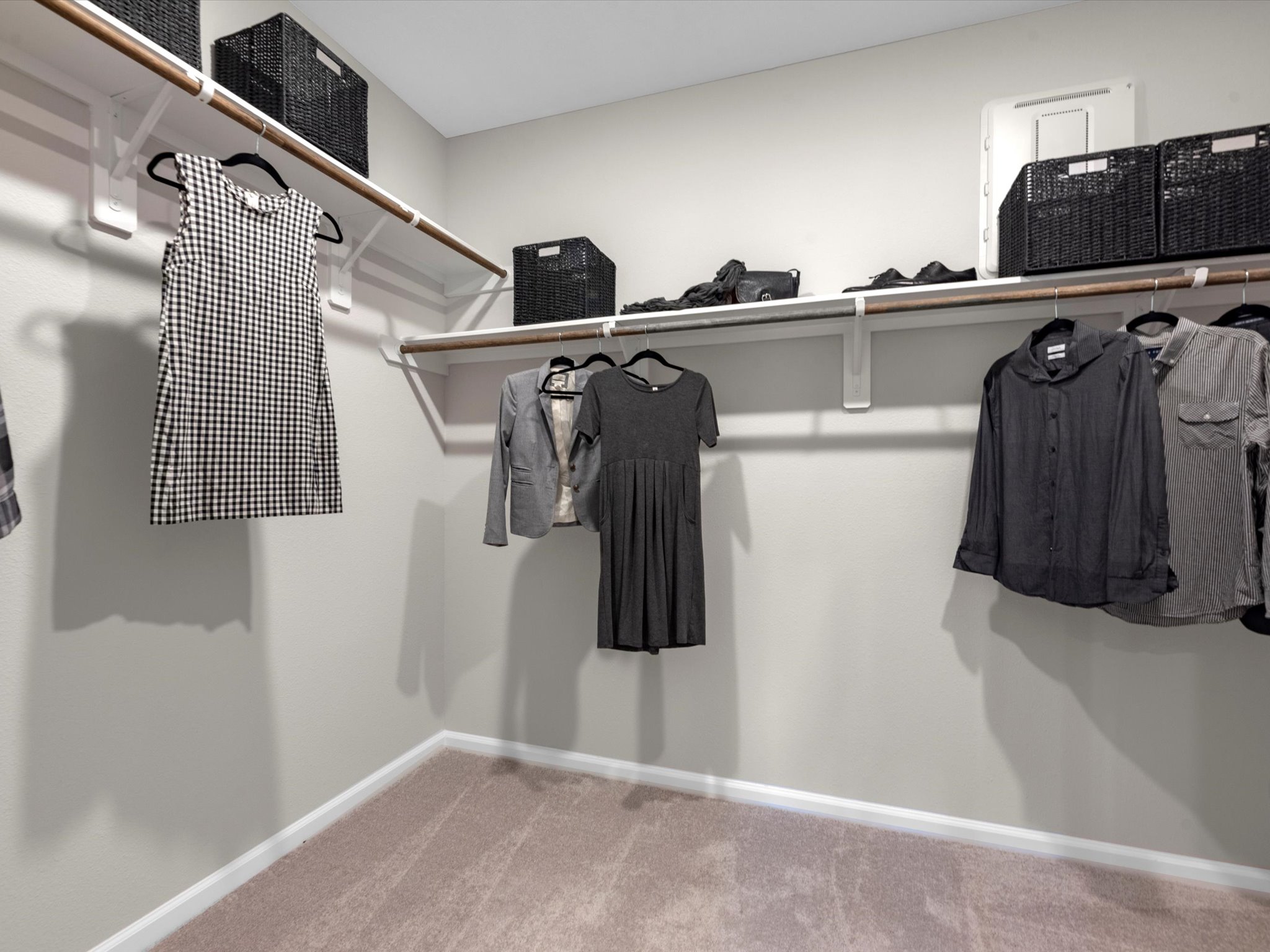 A group of clothes on a wall.