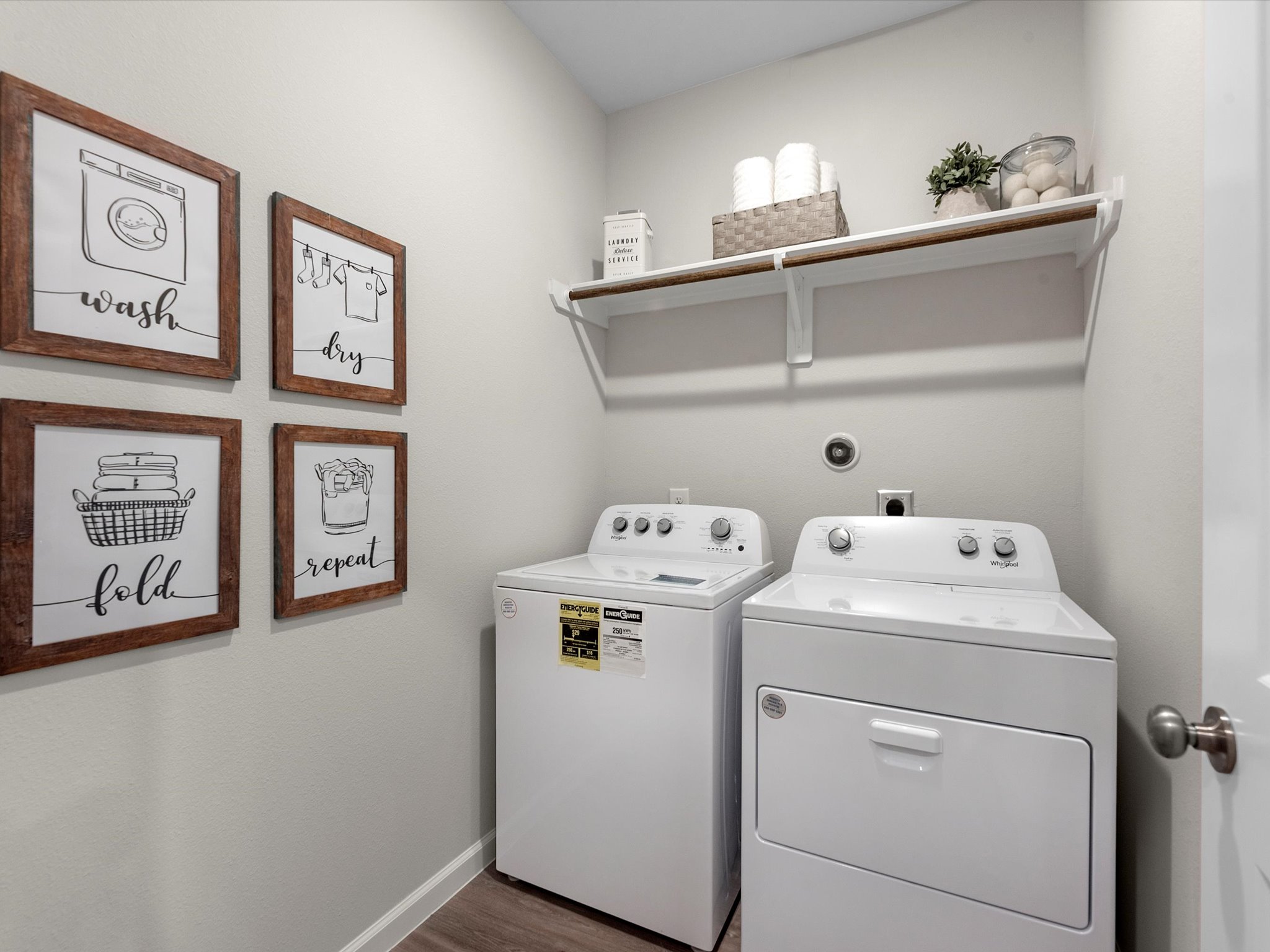 A laundry room with a washer and dryer.