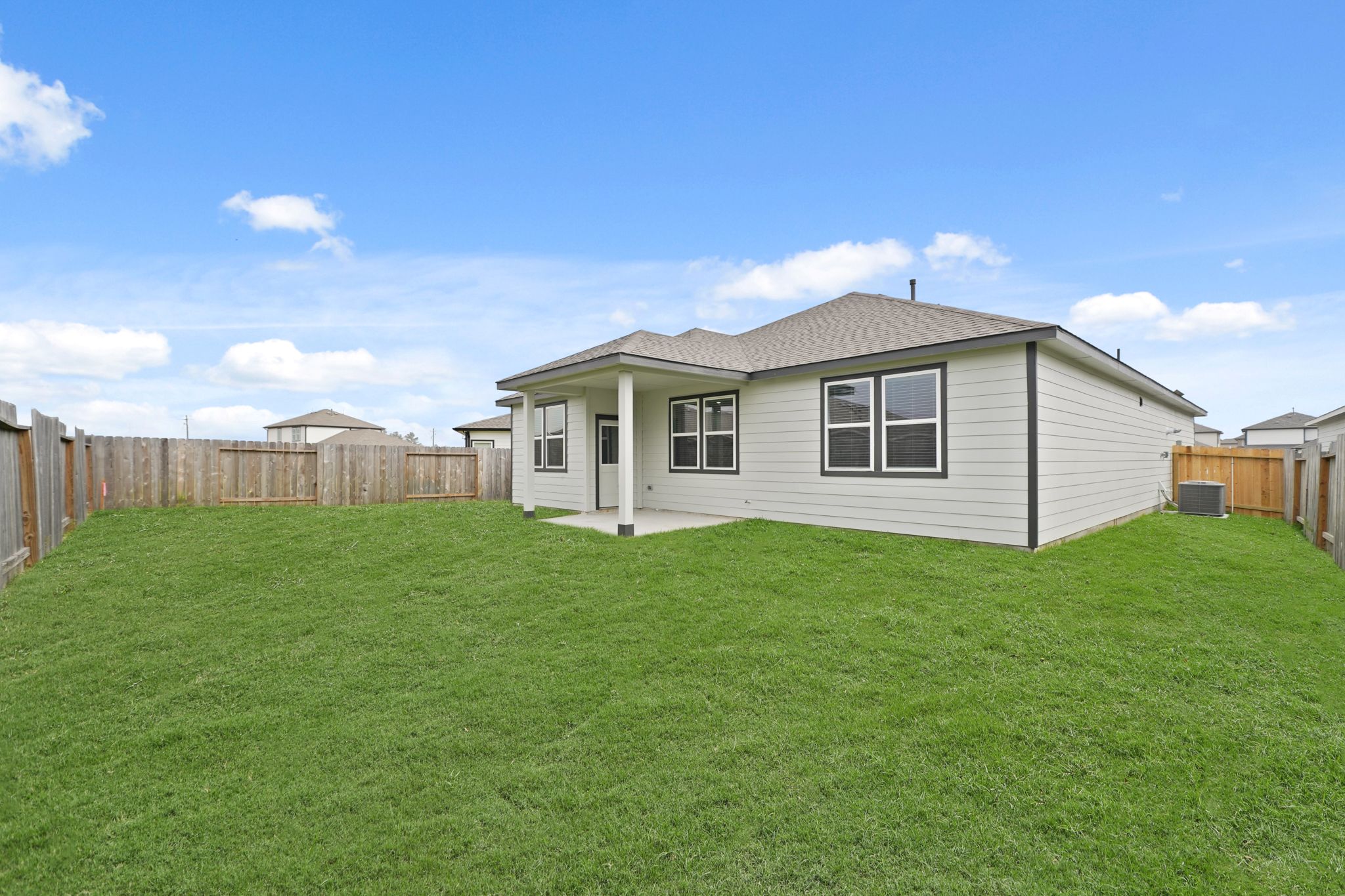 A house with a fence around it.