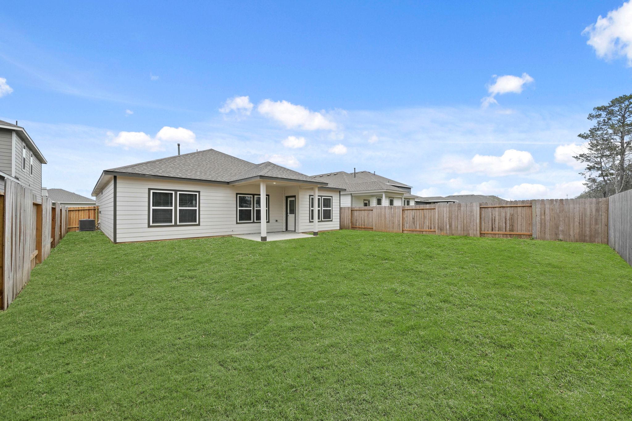 A house with a fence around it.