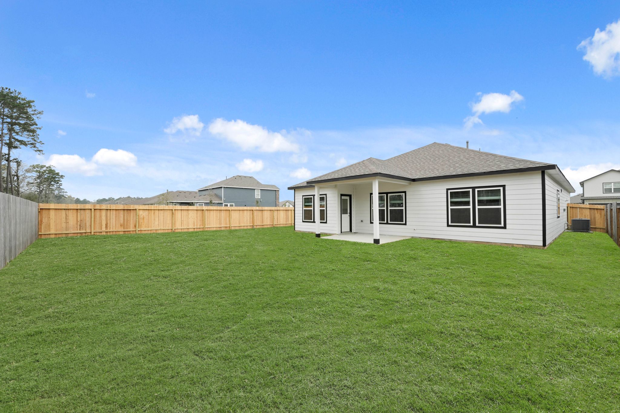 A house with a fence around it.