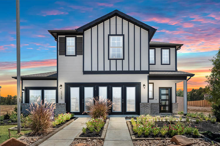 A house with a large front yard.