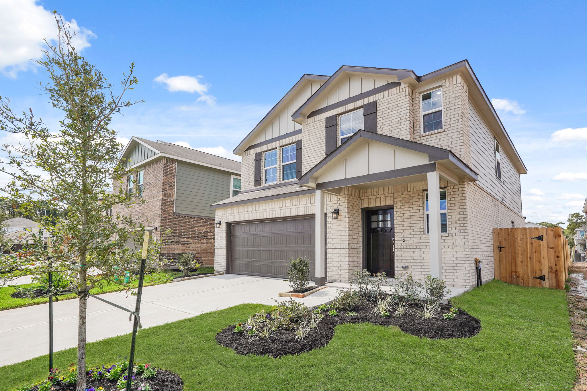 A house with a large front yard.