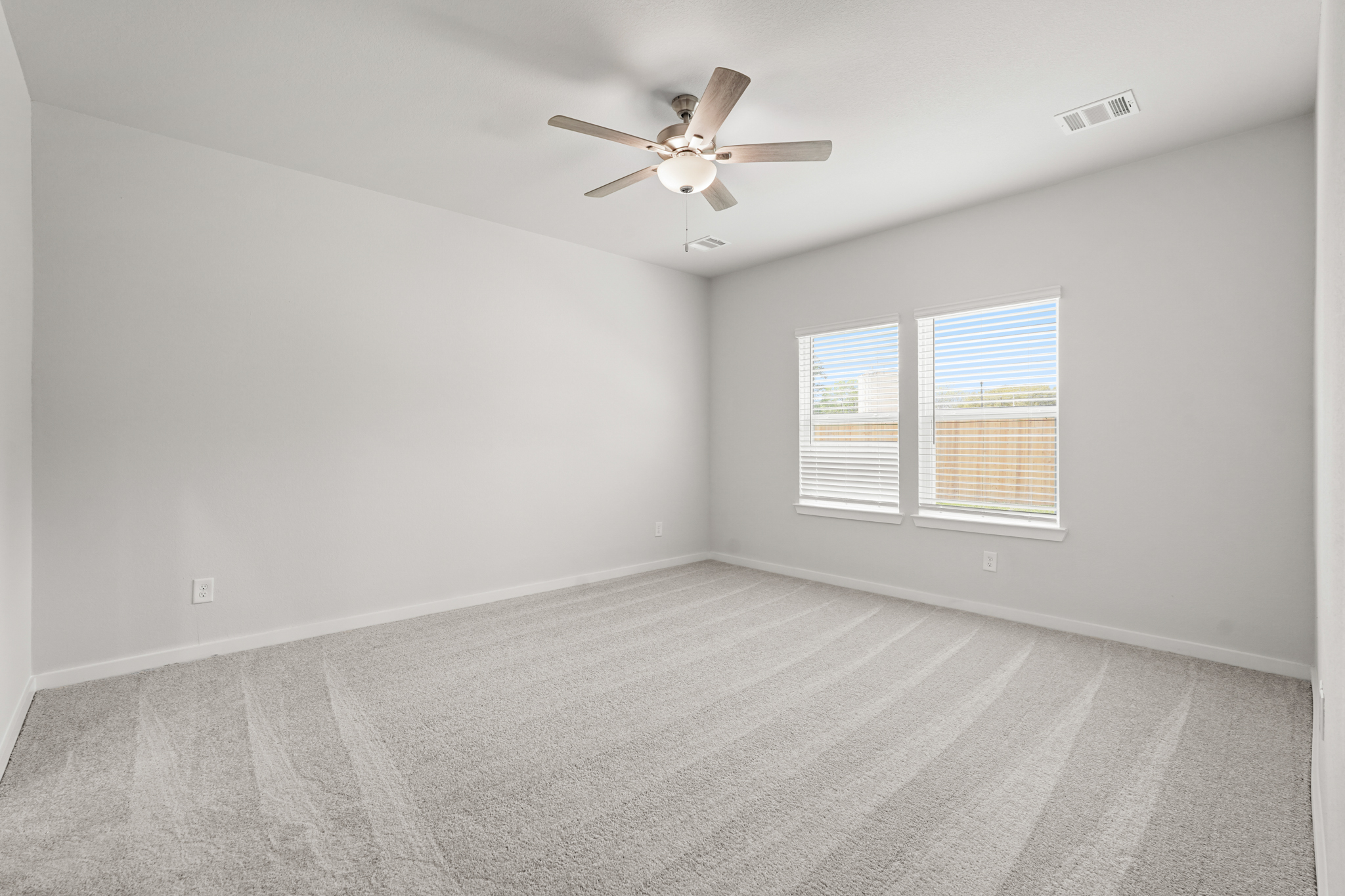 A ceiling fan in a room.