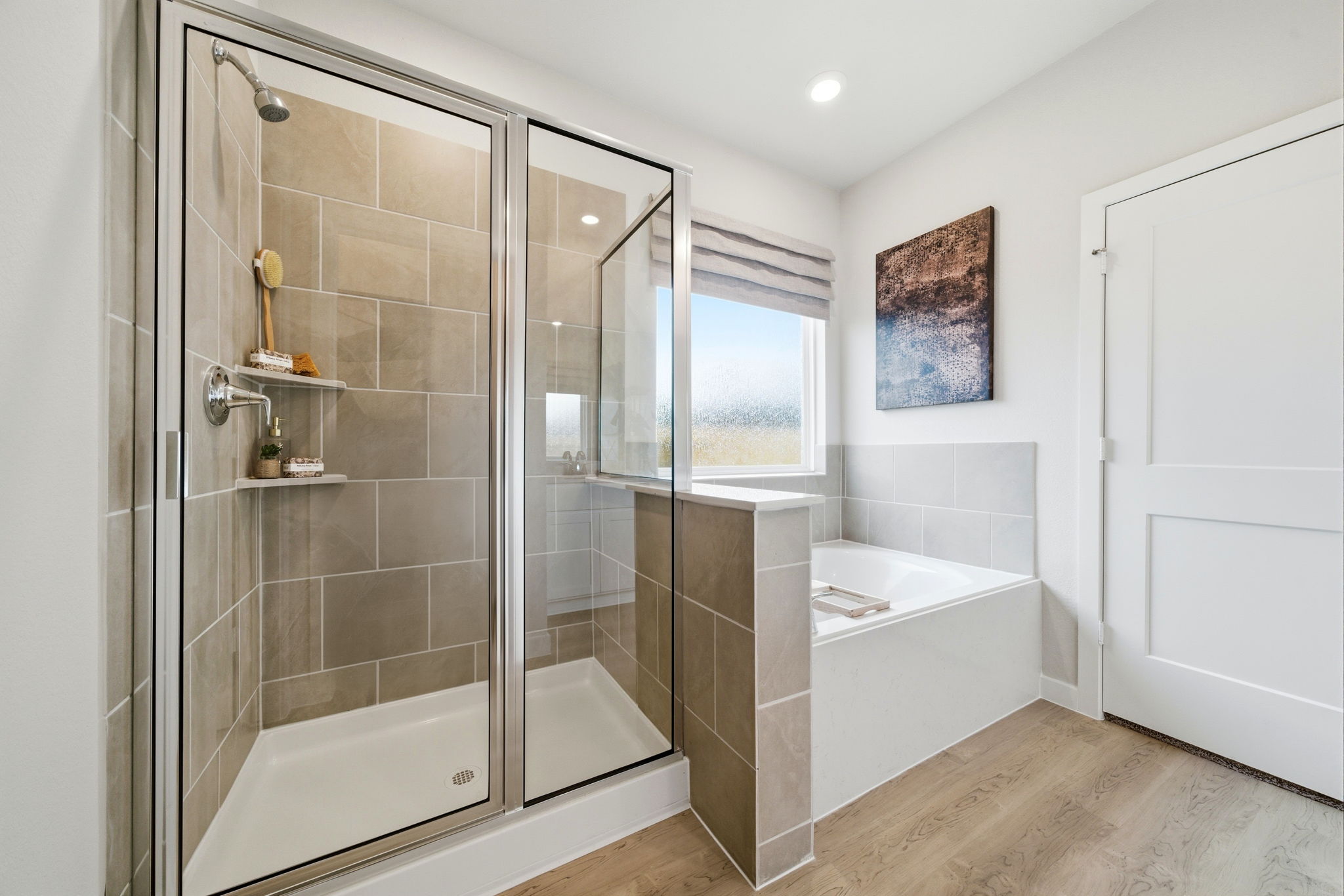 A bathroom with a glass shower.