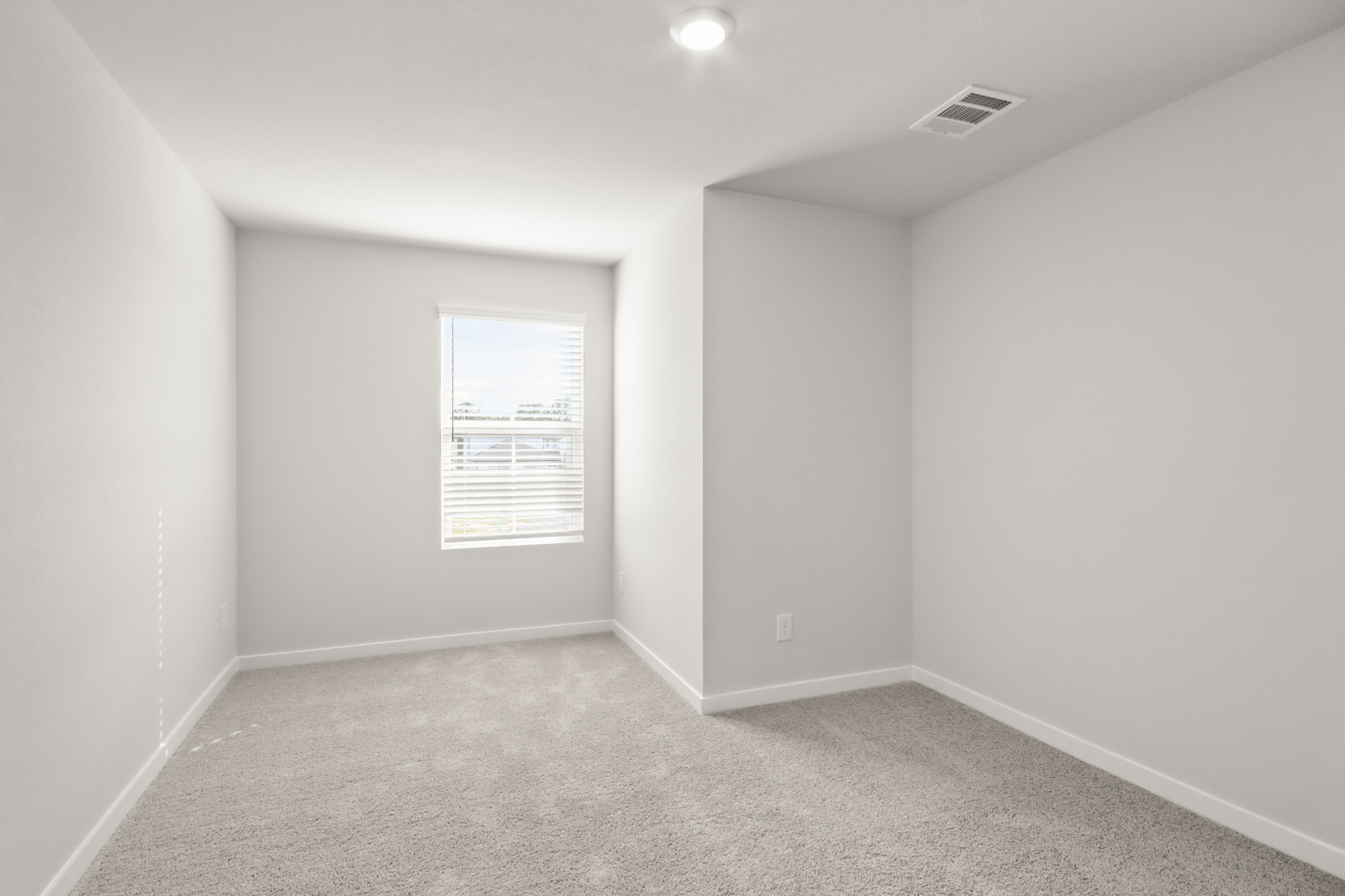 A room with a sign on the wall.