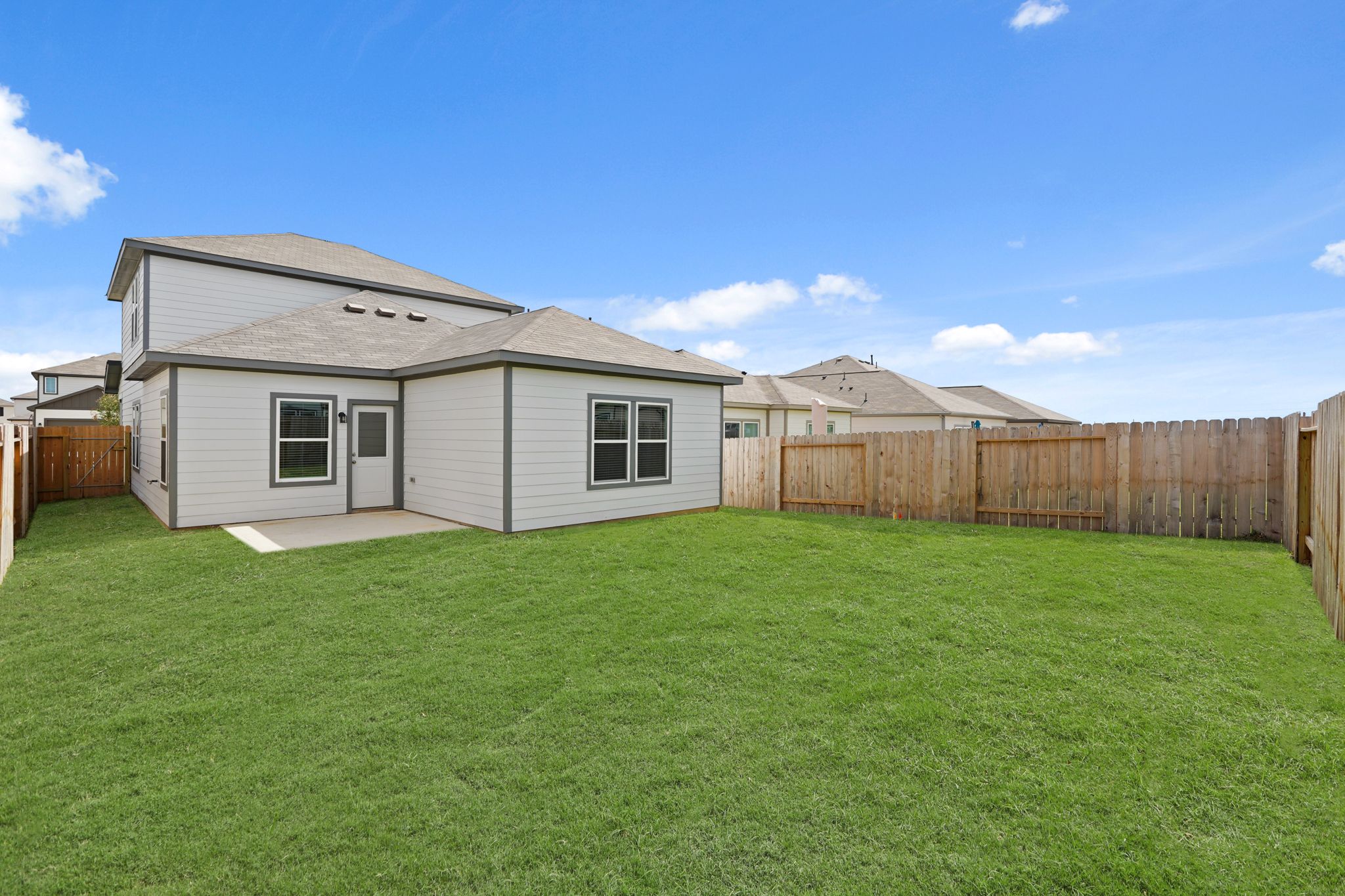 A house with a fence around it.