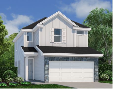 A white house with a garage.