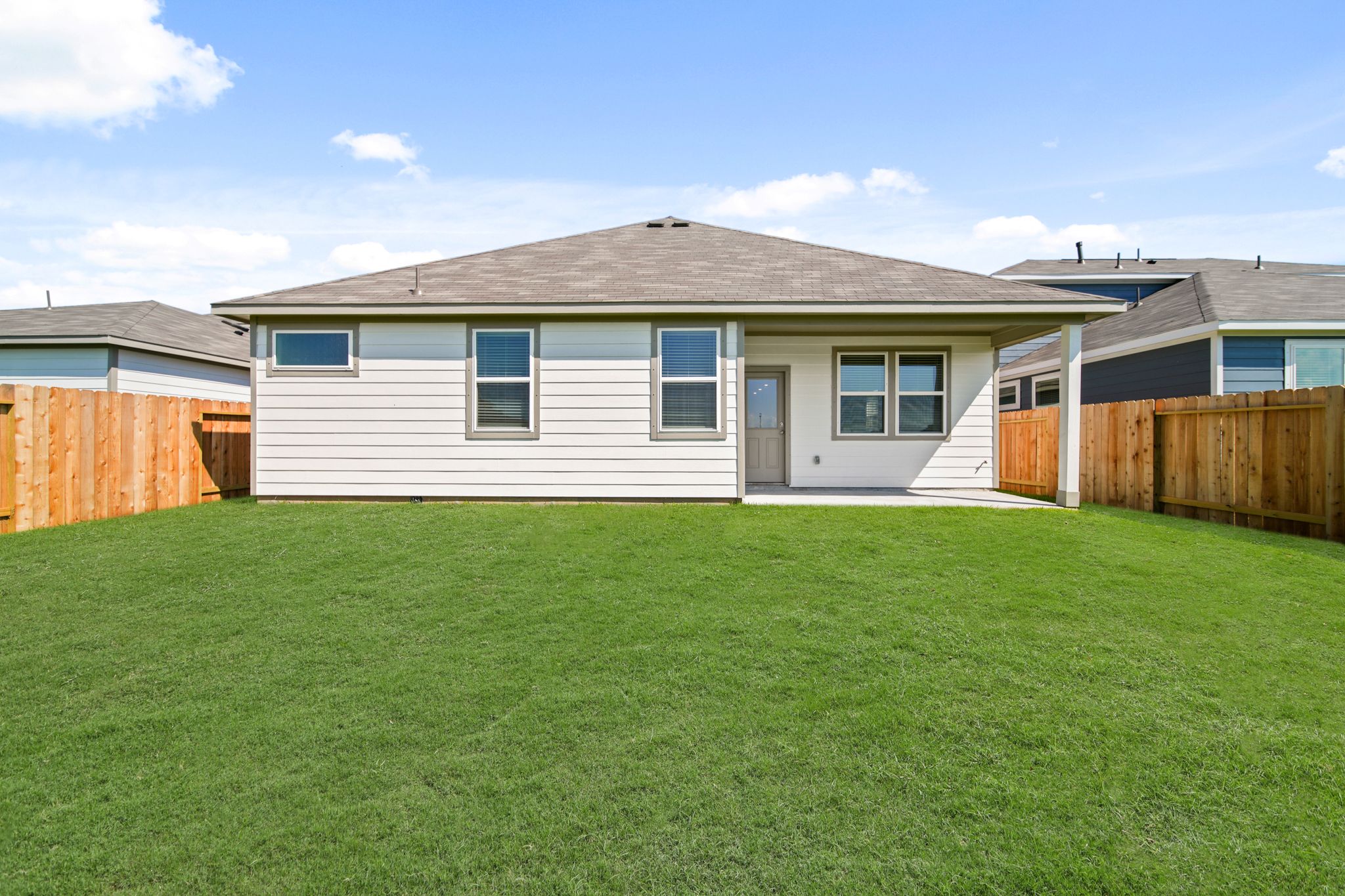 A house with a fence around it.