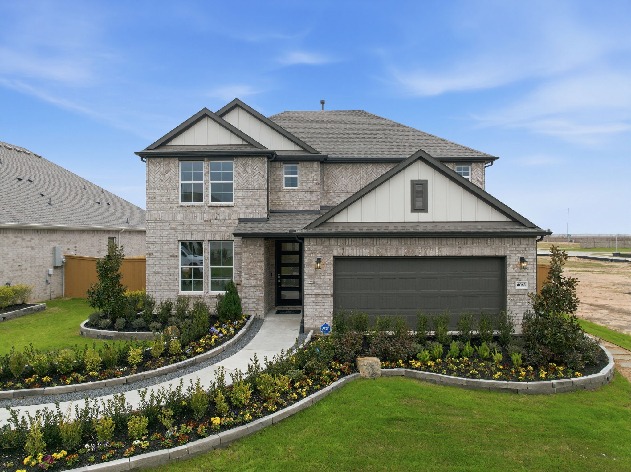 A house with a large front yard.
