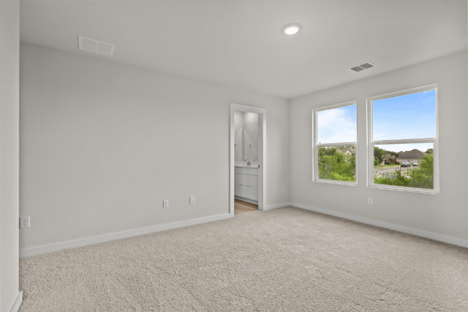 A room with a window and a door.