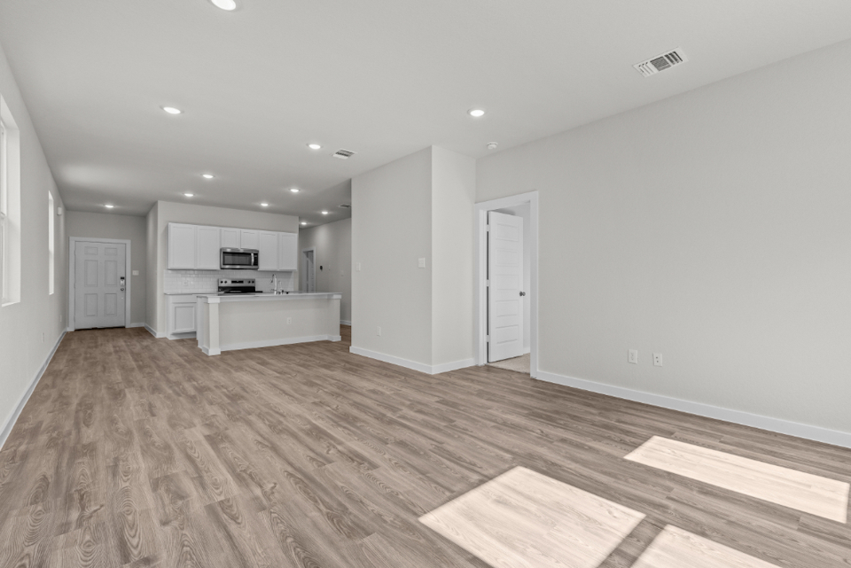 A large empty living room.