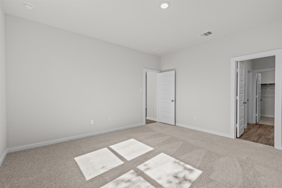 A room with a rug and a rug.